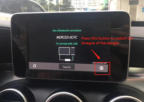 How do I change the dongle language after connecting with the device?