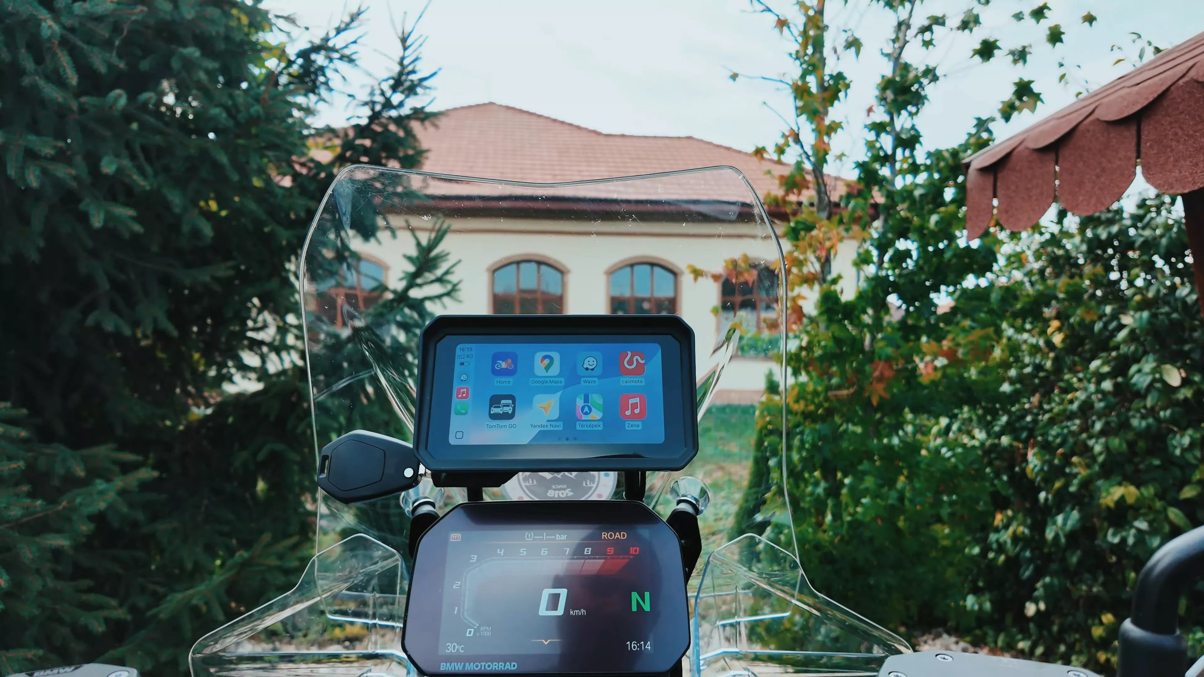 Motorcycle with a digital display in a scenic outdoor setting